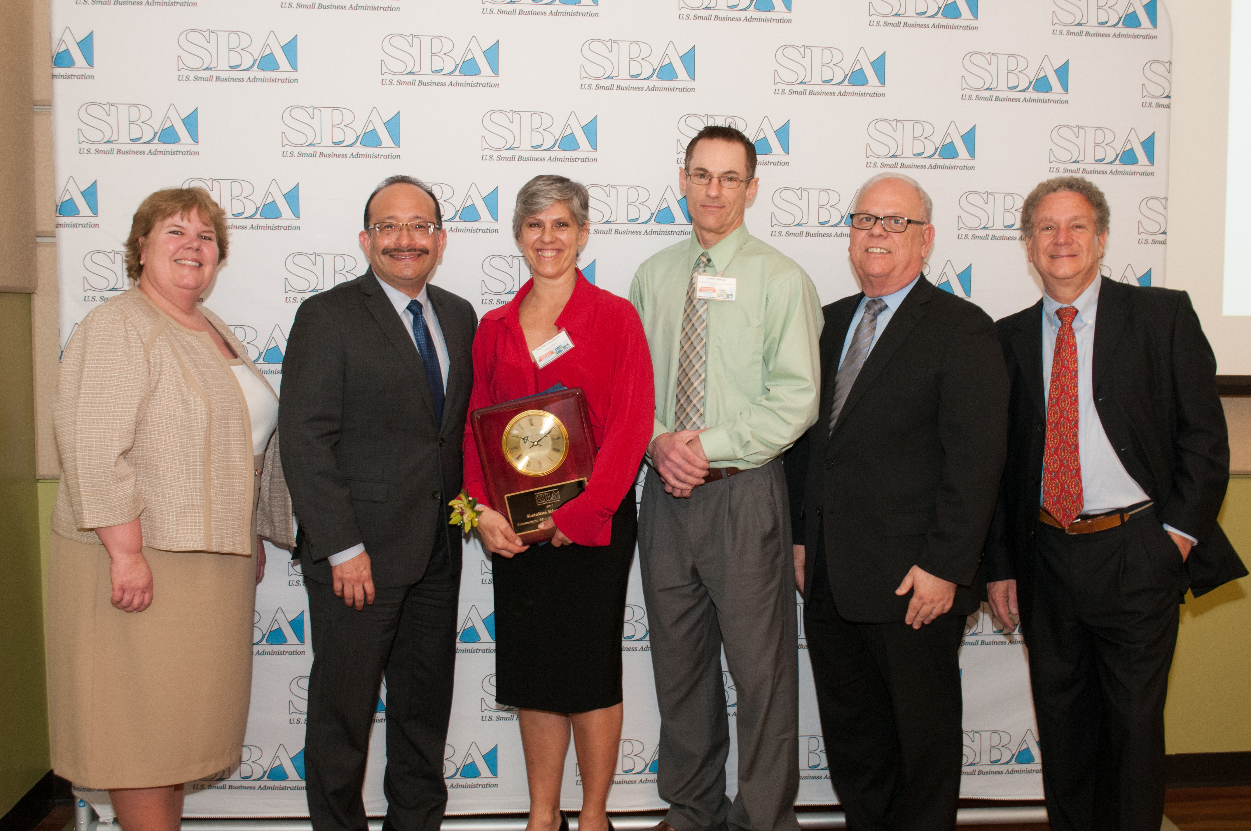 LtoR: Anne Hunt SBA District Director, Angel Fernandez, City of New Haven, Katalina Riegelmann, Katalina’ s Bakery, Andrew Scarpa, CEDF, Mark Hayward, Acting Regional Administrator, Mark Cutler Regional VP, SCORE.