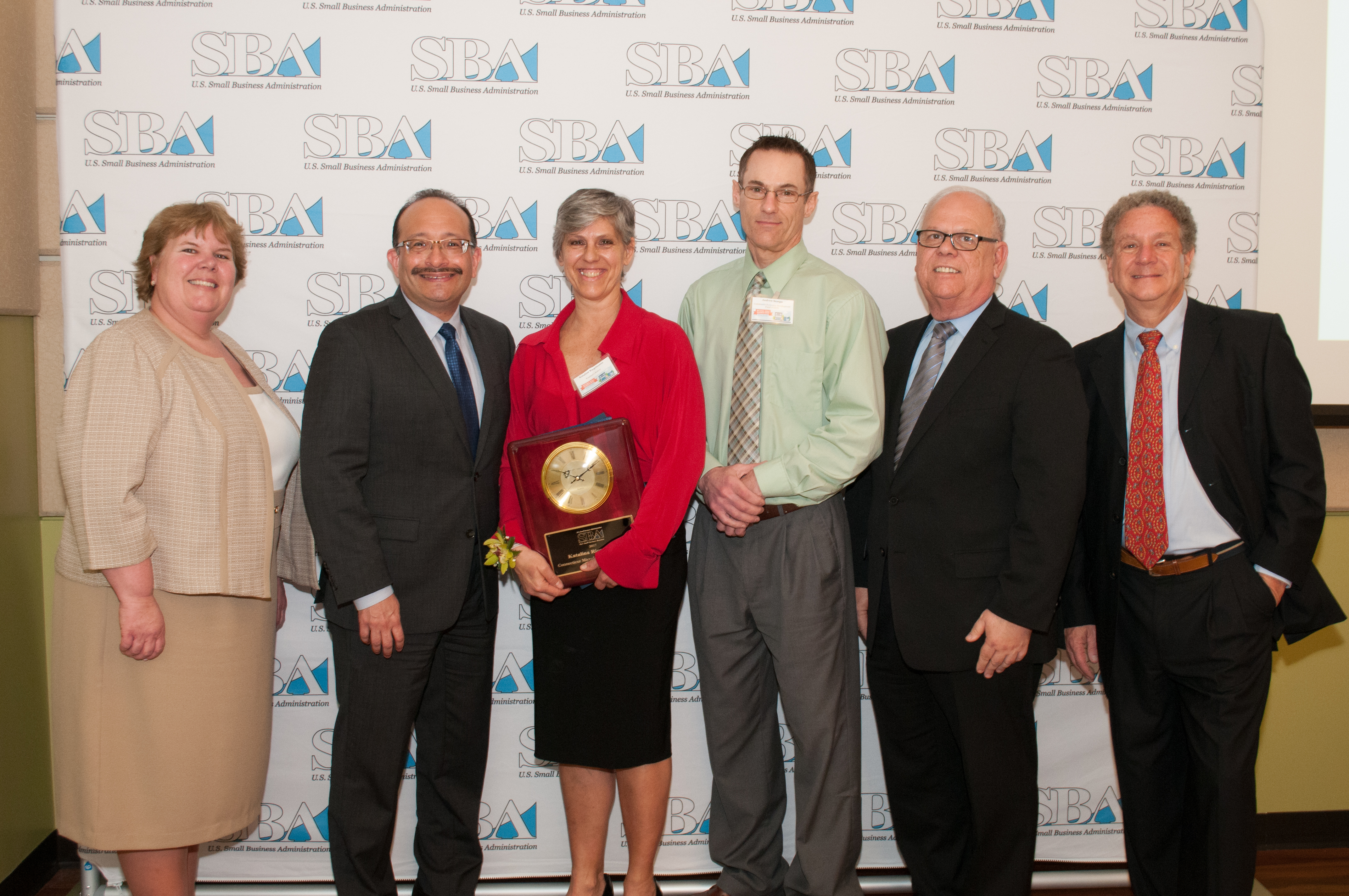 LtoR: Anne Hunt SBA District Director,  Angel Fernandez, City of New Haven, Katalina Riegelmann, Katalina’ s Bakery, Andrew Scarpa, CEDF, Mark Hayward, Acting Regional Administrator, Mark Cutler Regional VP, SCORE.